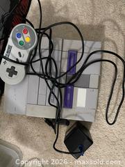 MaxSold Auction: Nintendo Super Nintendo Entertainment System (SNES) Console - Toronto (Ontario, Canada) SELLER MANAGED Moving Online Auction - Kennedy Road (STORAGE)