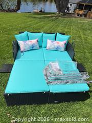 MaxSold Auction: NEW Outdoor 2-Person Wicker Daybed with Canopy & Cushions. Metal feet - Montague (Smiths Falls)(Ontario, Canada) PARTNER MANAGED Downsizing Online Auction -  Rainbow Valley Drive