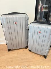 MaxSold Auction: SwissGear Silver Hard Shell Luggage Set, Large & Medium - Montague (Smiths Falls)(Ontario, Canada) PARTNER MANAGED Downsizing Online Auction -  Rainbow Valley Drive