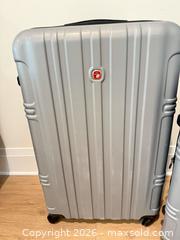 MaxSold Auction: SwissGear Silver Hard Shell Luggage Set, Large & Medium - Montague (Smiths Falls)(Ontario, Canada) PARTNER MANAGED Downsizing Online Auction -  Rainbow Valley Drive