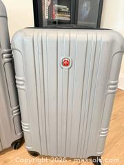 MaxSold Auction: SwissGear Silver Hard Shell Luggage Set, Large & Medium - Montague (Smiths Falls)(Ontario, Canada) PARTNER MANAGED Downsizing Online Auction -  Rainbow Valley Drive