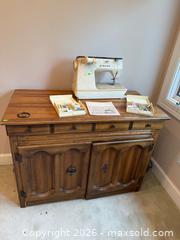 MaxSold Auction: Singer Sewing Machine & Cabinet - Walworth (New York, USA) PARTNER MANAGED Estate Sale Online Auction - Fairway 18