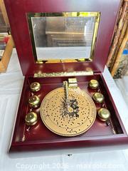 MaxSold Auction: Mr. Christmas Mahogany Disc Music Box - Morgan Hill (California, USA) PARTNER MANAGED Estate Sale Online Auction -  Dougherty Avenue