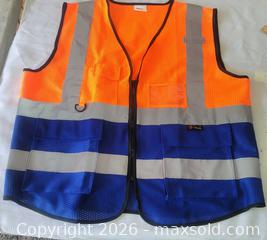 MaxSold Auction: New Zojo branded orange and navy blue high visibility safety vest size 2XL - Ottawa (Ontario, Canada) SELLER MANAGED Downsizing Online Auction - Woodpark Way