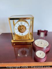 MaxSold Auction: Jaeger-LeCoultre Atmos Brass & Glass Torsion Clock - Tillsonburg (Ontario, Canada) SELLER MANAGED Downsizing Online Auction - Wilson Avenue