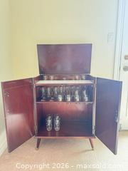 MaxSold Auction: Mid-Century Dark Walnut/Mahogany Bar Cabinet with Glassware - Tillsonburg (Ontario, Canada) SELLER MANAGED Downsizing Online Auction - Wilson Avenue