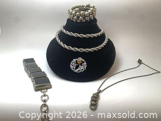 MaxSold Auction: Vintage Mid-Century Silver-Tone Jewelry Lot with Rhinestone Accents - Victoria (British Columbia, Canada) SELLER MANAGED Downsizing Online Auction -  Camosun Street (CONDO)