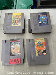 MaxSold Auction: A LOT OF 4 NINTENDO NES. GAMES. - Hamilton (Ontario, Canada) SELLER MANAGED Estate Sale Online Auction - Saint Clair Avenue