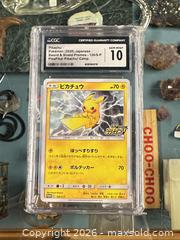 MaxSold Auction: Pikachu 125 CGC 10 Pokemon  - Vancouver (British Columbia, Canada) PARTNER MANAGED Estate Sale Online Auction - Venables Street