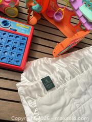 MaxSold Auction: Lot: Baby Satin-Trim Blanket, Crochet Afghan, Toys & Perfection - North Vancouver (British Columbia, Canada) SELLER MANAGED Downsizing Online Auction - Broadview Drive