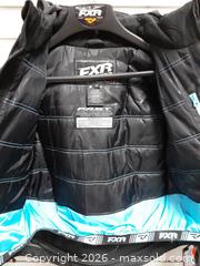 MaxSold Auction: FXR Youth Snowmobile Jacket Size 10 Black with Spectrum Accents - Augusta (Prescott)(Ontario, Canada) SELLER MANAGED Commercial Liquidation Online Auction - Edward Street North