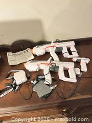 MaxSold Auction: Laser X Laser Tag Set — White, Orange & Gray - Grand Blanc Township (Michigan, USA) SELLER MANAGED Downsizing Online Auction - E Baldwin Road