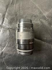 MaxSold Auction: Sigma 35-135mm f/3.5-4.5 Zoom Lens for Minolta A / Sony A - Grand Blanc Township (Michigan, USA) SELLER MANAGED Downsizing Online Auction - E Baldwin Road
