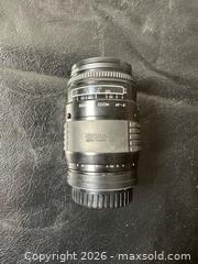 MaxSold Auction: Sigma 35-135mm f/3.5-4.5 Zoom Lens for Minolta A / Sony A - Grand Blanc Township (Michigan, USA) SELLER MANAGED Downsizing Online Auction - E Baldwin Road