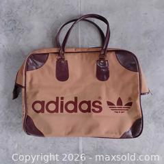 MaxSold Auction: Vintage 1970s Adidas Boston Bag – Tan with Brown Accents – Excellent Condition - Toronto (Ontario, Canada) SELLER MANAGED Reseller Online Auction - Esandar Drive (STORAGE)