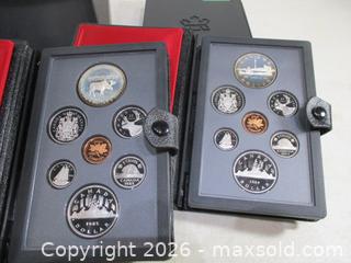 MaxSold Auction: 1984 & 1985 Royal Canadian Mint Double Silver Dollar Sets. 1985 Moose & Canoe Dollars With 1984 Toronto Skyline & Canoe Dollars. - Toronto (Ontario, Canada) SELLER MANAGED Estate Sale Online Auction - Annette Street