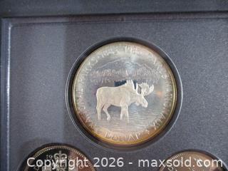 MaxSold Auction: 1984 & 1985 Royal Canadian Mint Double Silver Dollar Sets. 1985 Moose & Canoe Dollars With 1984 Toronto Skyline & Canoe Dollars. - Toronto (Ontario, Canada) SELLER MANAGED Estate Sale Online Auction - Annette Street