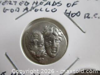 MaxSold Auction: Ancient Greek Silver Currency Coin. Inverted Heads Of APOLLO. Reverse: Eagle Grasping Dolphin. - Toronto (Ontario, Canada) SELLER MANAGED Estate Sale Online Auction - Annette Street