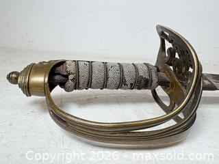 MaxSold Auction: Antique 1822/45 Pattern British Infantry Sword. Mid 1800's Queen Victoria. Henry Wilkinson "Proved" Slug/Disc at Base Of Sword.  - Toronto (Ontario, Canada) SELLER MANAGED Estate Sale Online Auction - Annette Street