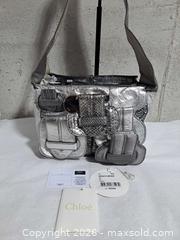 MaxSold Auction: Chloé Metallic Pythin Saskia Medium Crossbody Bag - Markham (Ontario, Canada) SELLER MANAGED Downsizing Online Auction - Major Mackenzie Drive East