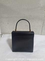 MaxSold Auction: Salvatore Ferragamo Gancini Small Top Handle handbag - Markham (Ontario, Canada) SELLER MANAGED Downsizing Online Auction - Major Mackenzie Drive East