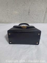 MaxSold Auction: Salvatore Ferragamo Gancini Small Top Handle handbag - Markham (Ontario, Canada) SELLER MANAGED Downsizing Online Auction - Major Mackenzie Drive East