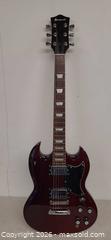 MaxSold Auction: Barracuda 6-String Electric Guitar, Cherry/Wine Red in working condition  - Toronto (Ontario, Canada) PARTNER MANAGED Reseller Online Auction - Queen Street Wt.