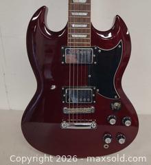 MaxSold Auction: Barracuda 6-String Electric Guitar, Cherry/Wine Red in working condition  - Toronto (Ontario, Canada) PARTNER MANAGED Reseller Online Auction - Queen Street Wt.