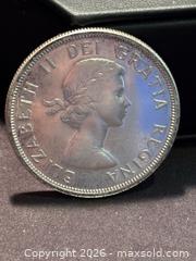 MaxSold Auction: 1959 Canada Silver Dollar Voyageur Coin – 80% Silver – Elizabeth II - Aurora (Ontario, Canada) SELLER MANAGED Estate Sale Online Auction -  Closs Square