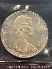MaxSold Auction: 1966 Canada Silver Dollar Voyageur Coin – 80% Silver – Elizabeth II- Mint State Certified  - Aurora (Ontario, Canada) SELLER MANAGED Estate Sale Online Auction -  Closs Square