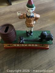 MaxSold Auction: 2 Rare Vintage Cast Iron Coin Banks - Ottawa (Ontario, Canada) SELLER MANAGED Reseller Online Auction - Canadian Shield Avenue (CONDO)