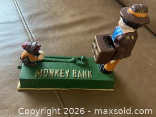 MaxSold Auction: 2 Rare Vintage Cast Iron Coin Banks - Ottawa (Ontario, Canada) SELLER MANAGED Reseller Online Auction - Canadian Shield Avenue (CONDO)