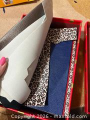 MaxSold Auction: Box of faux leather for crafts  - Hamilton (Ontario, Canada) SELLER MANAGED Downsizing Online Auction - Kensington Avenue N