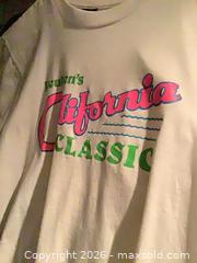 MaxSold Auction: Mixed Lot of Gildan, Hanes & Other Band/Movie T-Shirts - Redondo Beach (California, USA) PARTNER MANAGED Moving Online Auction - Clark Lane (CONDO)