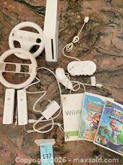 MaxSold Auction: Nintendo Wii Console Bundle White with Accessories & Games - Redondo Beach (California, USA) PARTNER MANAGED Moving Online Auction - Clark Lane (CONDO)
