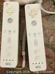 MaxSold Auction: Nintendo Wii Console Bundle White with Accessories & Games - Redondo Beach (California, USA) PARTNER MANAGED Moving Online Auction - Clark Lane (CONDO)