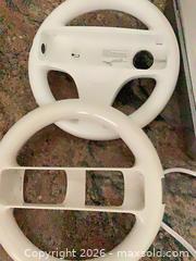 MaxSold Auction: Nintendo Wii Console Bundle White with Accessories & Games - Redondo Beach (California, USA) PARTNER MANAGED Moving Online Auction - Clark Lane (CONDO)