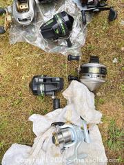 MaxSold Auction: Lot of 18 Fishing Rods & Several Reels with Tackle Box - Port Orchard (Washington, USA) SELLER MANAGED Downsizing Online Auction - Southwest Pine (STORAGE)
