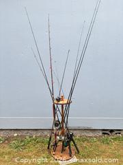 MaxSold Auction: Lot of 9 Fishing Rods, Reels and Wooden Rod Rack - Port Orchard (Washington, USA) SELLER MANAGED Downsizing Online Auction - Southwest Pine (STORAGE)