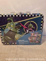 MaxSold Auction: Pokémon Collectible Tin with Promo Cards & 6 Booster Packs - Toronto (Ontario, Canada) SELLER MANAGED Downsizing Online Auction -  Rutland Street