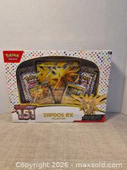 MaxSold Auction: Pokémon Scarlet & Violet - 151 Zapdos Collector Tin - Toronto (Ontario, Canada) SELLER MANAGED Downsizing Online Auction -  Rutland Street