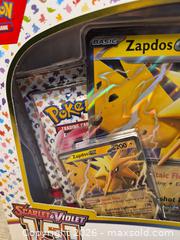 MaxSold Auction: Pokémon Scarlet & Violet - 151 Zapdos Collector Tin - Toronto (Ontario, Canada) SELLER MANAGED Downsizing Online Auction -  Rutland Street