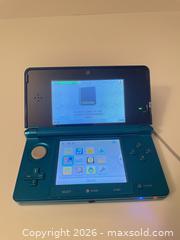 MaxSold Auction: Nintendo 3DS Handheld System, Charger, and Mario & Sonic at the Olympic Winter Video Games - Mississauga (Ontario, Canada) SELLER MANAGED Downsizing Online Auction - Summerville Court (STORAGE)