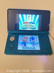 MaxSold Auction: Nintendo 3DS Handheld System, Charger, and Mario & Sonic at the Olympic Winter Video Games - Mississauga (Ontario, Canada) SELLER MANAGED Downsizing Online Auction - Summerville Court (STORAGE)