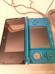 MaxSold Auction: Nintendo 3DS Handheld System, Charger, and Mario & Sonic at the Olympic Winter Video Games - Mississauga (Ontario, Canada) SELLER MANAGED Downsizing Online Auction - Summerville Court (STORAGE)