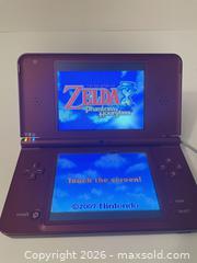 MaxSold Auction: Nintendo DSi XL Console with Legend of Zelda: Phantom Hourglass - Mississauga (Ontario, Canada) SELLER MANAGED Downsizing Online Auction - Summerville Court (STORAGE)