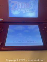 MaxSold Auction: Nintendo DSi XL Console with Legend of Zelda: Phantom Hourglass - Mississauga (Ontario, Canada) SELLER MANAGED Downsizing Online Auction - Summerville Court (STORAGE)