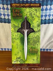 MaxSold Auction: Lord of the Rings “Sting” Sword Replica w/ Box & Plaque LOTR Frodo Bilbo - Hamilton (Ontario, Canada) SELLER MANAGED Estate Sale Online Auction - Gertrude Street