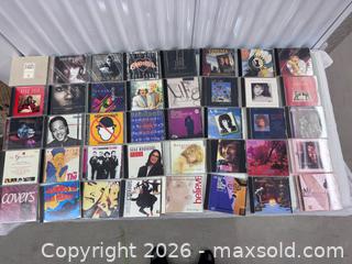 MaxSold Auction: Collection of 40 Assorted Rock, Pop & Classic Hits CDs - North York (Ontario, Canada) SELLER MANAGED Downsizing Online Auction -  Bridgeland Avenue