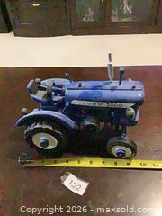 MaxSold Auction: Blue Wooden Ford 2000 Toy Tractor, 8-12 in hand made - Ottawa (Ontario, Canada) SELLER MANAGED Downsizing Online Auction - Oaklawn Crescent